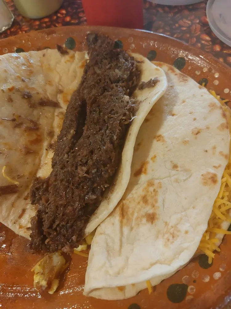 Barbacoa Taco and Potatoe Egg and Cheese Taco